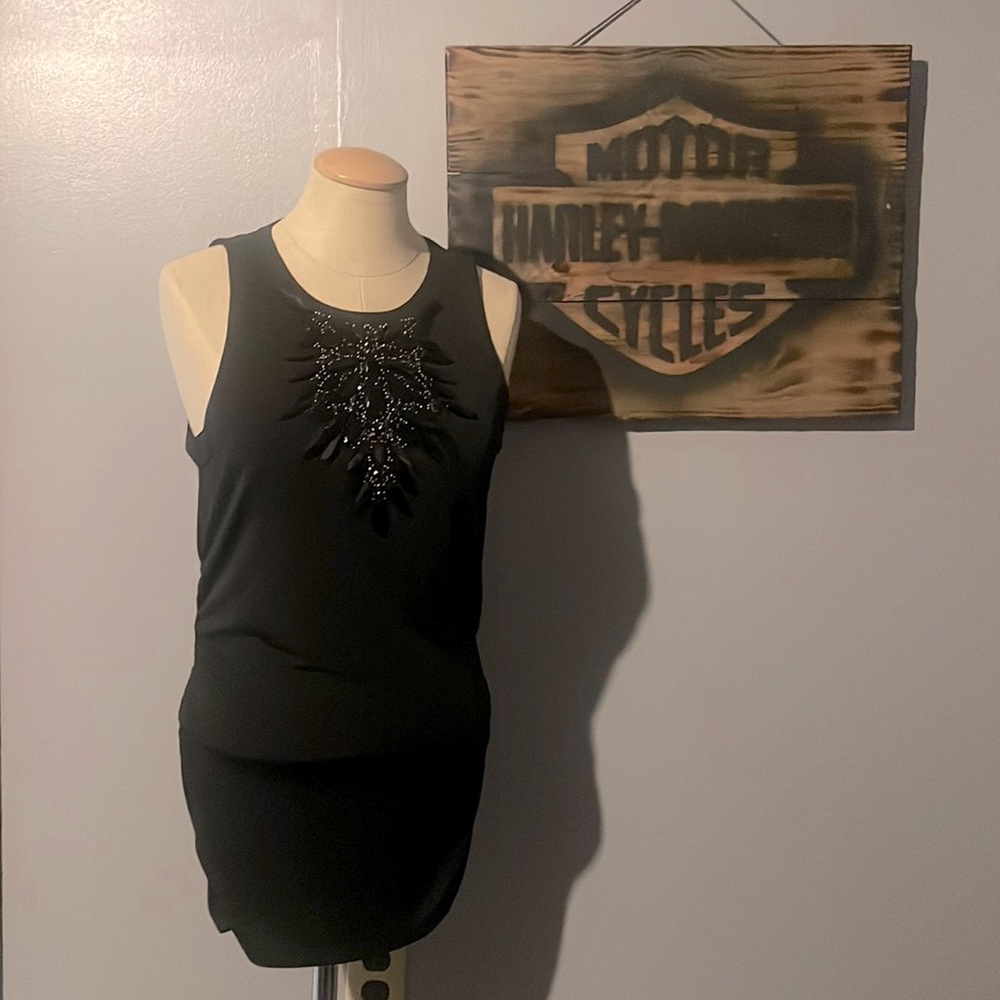 Short sexy mini dress , with pretty beaded design on front
